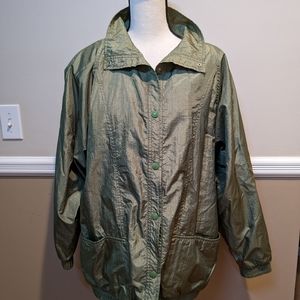 Women's nylon windbreaker, size large. Pretty olive color. Snaps. Lined.